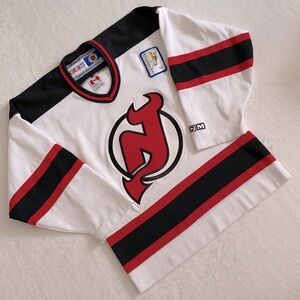 {VTG} CCM | NHL New Jersey Devils Hockey Official Licensed Team Jersey Youth S/M
